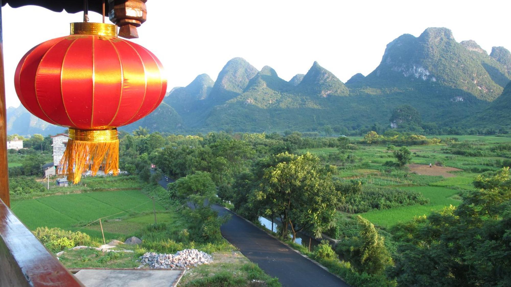 Yangshuo Tea Cozy--One Way Free Pick Up From Airport Or Ts 4 Nights Pensionat Exteriör bild