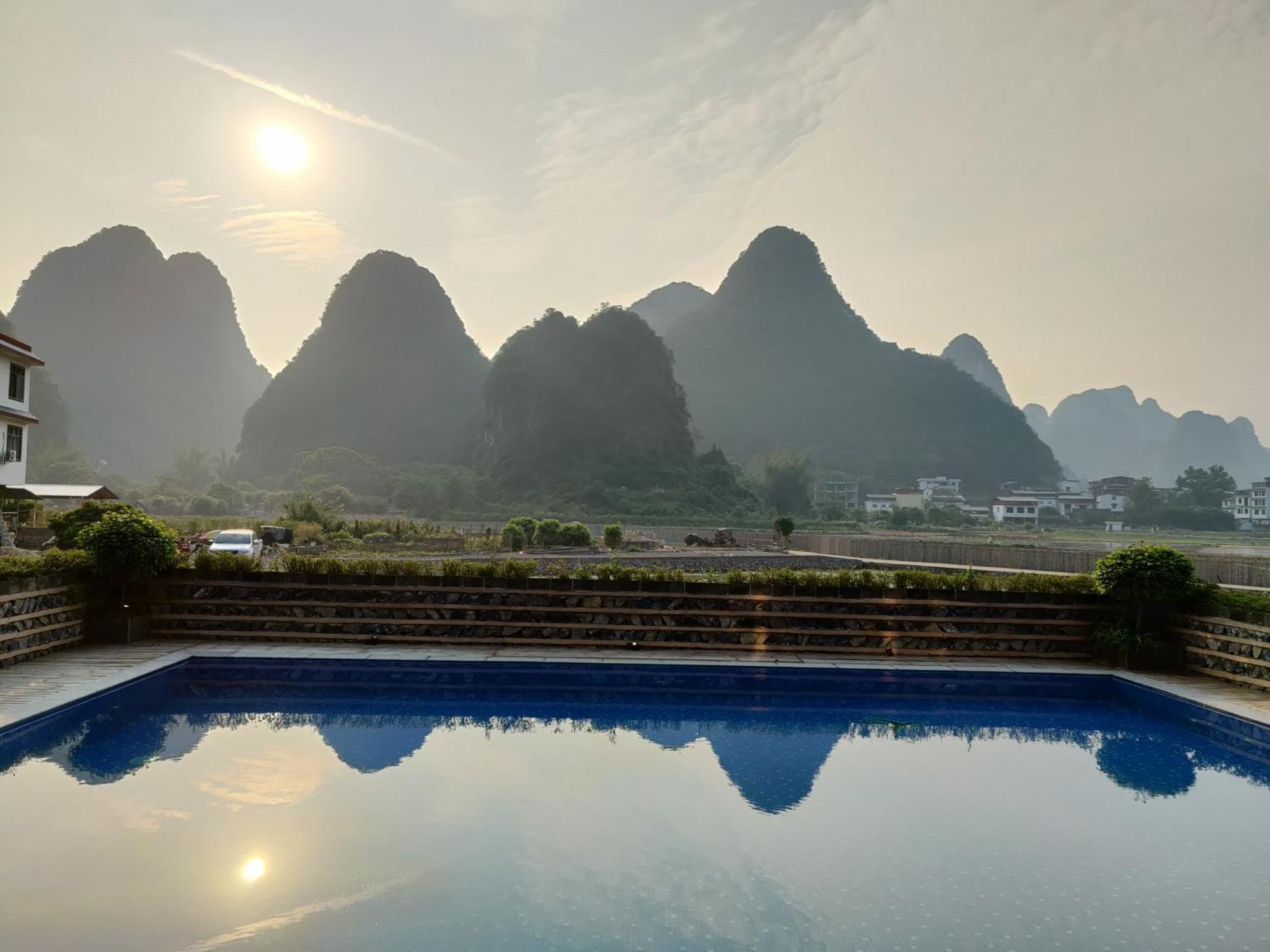 Yangshuo Tea Cozy--One Way Free Pick Up From Airport Or Ts 4 Nights Pensionat Exteriör bild